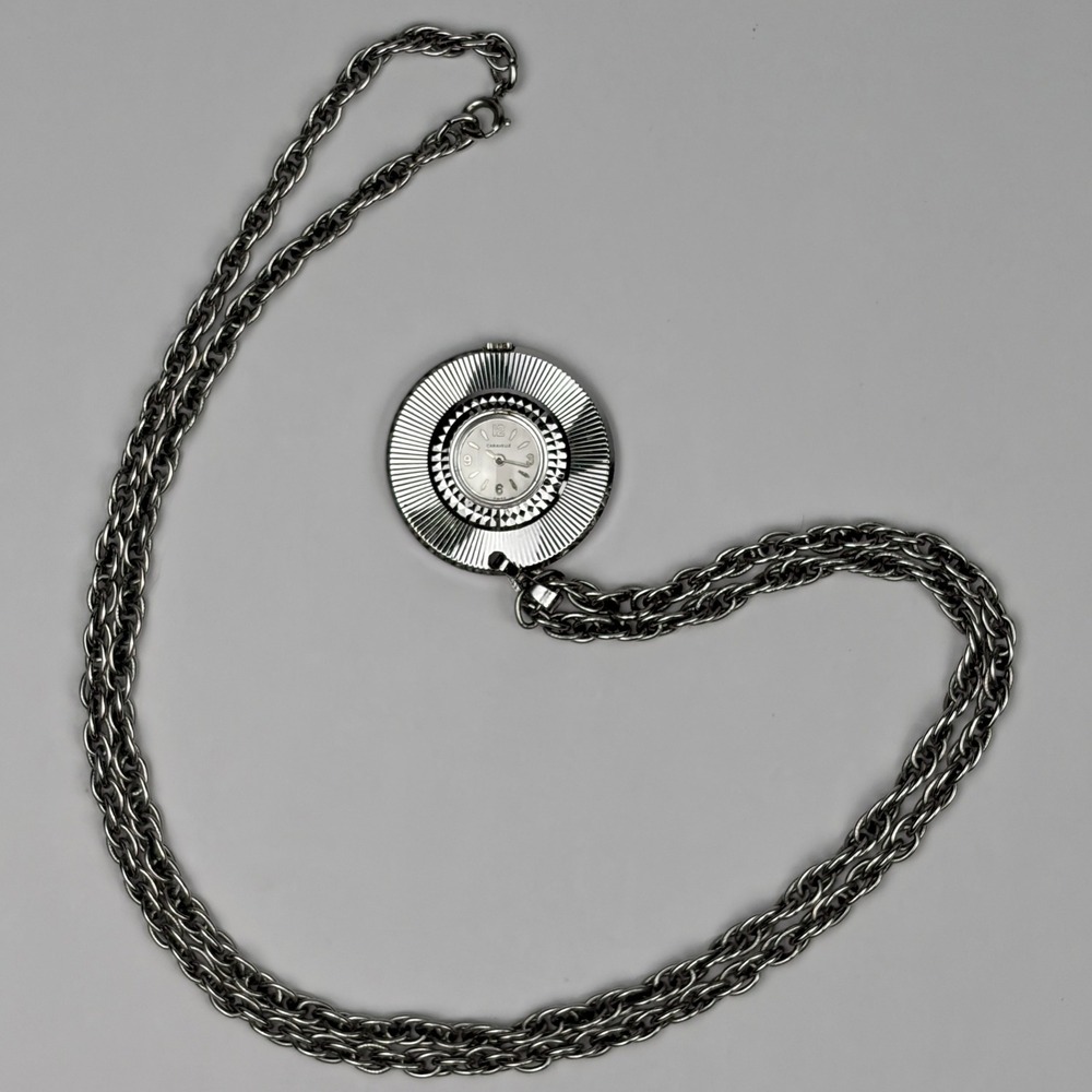 Vintage Caravelle Silver Tone Sunburst Pendant Watch Long Chain Swiss Made